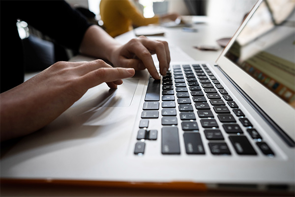 _0031_close-up-of-hands-of-businessman-typing-on-a-laptop